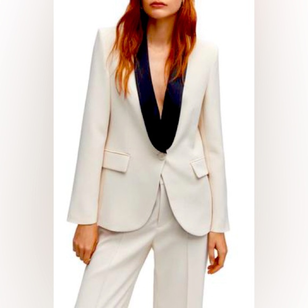 Modern Sleek Off White Blazer and the satin black trim. Never worn.